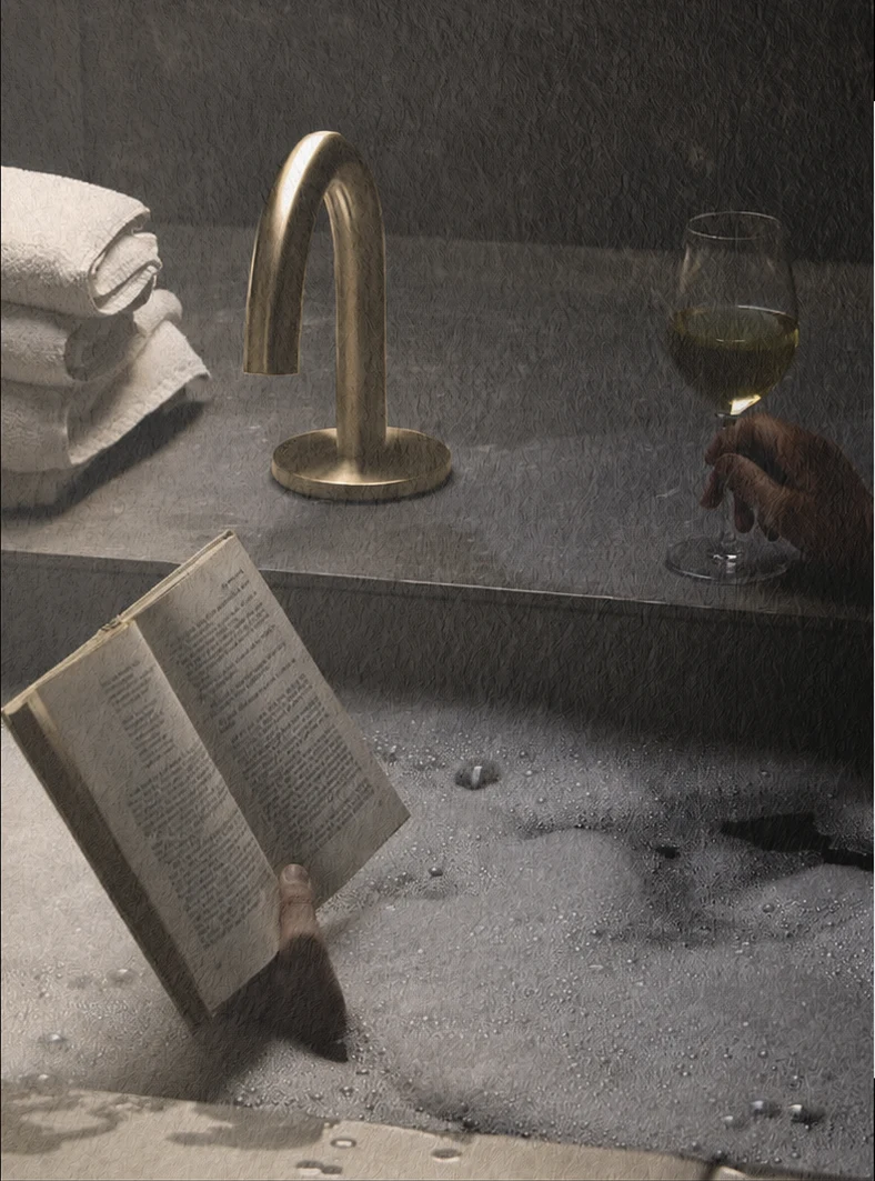 A glass of wine, fresh towels and a book beside the bath at Ū Villas
